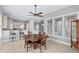 Cozy breakfast nook features large windows and a stylish ceiling fan at 1533 Biltmore Dr., Myrtle Beach, SC 29579