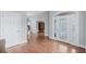 Inviting foyer with a decorative glass door and hardwood floors that leads to an open living space at 1533 Biltmore Dr., Myrtle Beach, SC 29579