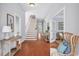 Welcoming foyer with hardwood floors, a staircase, and stylish decor, setting a sophisticated tone at 1533 Biltmore Dr., Myrtle Beach, SC 29579