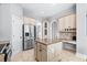 Spacious kitchen boasts a center island, stainless steel appliances, and ample cabinet space at 1533 Biltmore Dr., Myrtle Beach, SC 29579