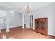 Bright, open space with an arched ceiling, hardwood floors, neutral paint, and white pillars at 1533 Biltmore Dr., Myrtle Beach, SC 29579