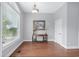 Bright, open space with neutral paint, hardwood floors, and large windows for natural light at 1533 Biltmore Dr., Myrtle Beach, SC 29579