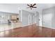 Bright, open-concept living area boasts hardwood floors and seamless transition to the kitchen at 1533 Biltmore Dr., Myrtle Beach, SC 29579