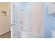 Clean bathroom with shower/tub combo and rainbow curtain at 4333 Windy Heights Dr., North Myrtle Beach, SC 29582