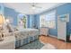 Cozy bedroom featuring hardwood floors and an arch window at 4333 Windy Heights Dr., North Myrtle Beach, SC 29582