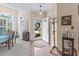 Welcoming entryway with hardwood floors, coat rack, and view of living room at 4333 Windy Heights Dr., North Myrtle Beach, SC 29582