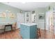 Kitchen with teal island and built-in corner cabinets at 4333 Windy Heights Dr., North Myrtle Beach, SC 29582