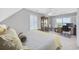 Comfortable bedroom with soft carpet, shutters, desk, display cabinet, and ceiling fan at 4524 Landing Rd., Little River, SC 29566