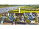 Beautiful elevated home with a deck overlooking a tranquil waterway and marina in a coastal community at 4524 Landing Rd., Little River, SC 29566