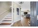Open doorway to a staircase and an open floor plan featuring the living room at 4524 Landing Rd., Little River, SC 29566