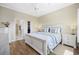 Spacious main bedroom featuring a coastal decor, hardwood floors, and two closets at 4524 Landing Rd., Little River, SC 29566