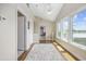 Bright sunroom with large windows offering scenic views of the water at 4524 Landing Rd., Little River, SC 29566