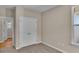 Bedroom featuring neutral walls, a window and carpet flooring plus a view to other rooms at 626 Castle Ct., Myrtle Beach, SC 29579