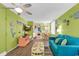 Inviting living room featuring colorful decor, comfortable seating, and an open layout connected to the dining area at 7000 Ocean Blvd. N # 133, Myrtle Beach, SC 29572