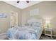 Second bedroom with a queen bed and calming decor at 500 River Oaks Dr. # 58I, Myrtle Beach, SC 29579