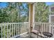 Private screened balcony overlooking lush trees and greenspace at 500 River Oaks Dr. # 58I, Myrtle Beach, SC 29579