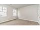 Bright bedroom with neutral carpet and two windows to let in natural light at 368 Clear Lake Dr., Conway, SC 29526