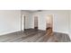 Spacious bedroom with vinyl floor, multiple doorways, and ample natural light at 368 Clear Lake Dr., Conway, SC 29526