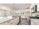 Kitchen featuring white cabinets, stainless steel appliances, granite counters and gray floors at 368 Clear Lake Dr., Conway, SC 29526
