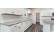 Kitchen counter with white cabinets, gray granite countertops and tile backsplash at 368 Clear Lake Dr., Conway, SC 29526