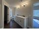 Bathroom featuring a double vanity, tile flooring, and modern light fixtures at 1033 Sioux Swamp Dr., Conway, SC 29527