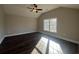 Bedroom featuring dark wood floors, neutral paint and a large window at 1033 Sioux Swamp Dr., Conway, SC 29527