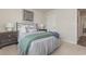 Bedroom with a double bed, nightstands and neutral decor at 3865 Lady Bug Dr., Shallotte, NC 28470