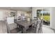 Bright dining area with table and chairs, view of backyard at 3865 Lady Bug Dr., Shallotte, NC 28470