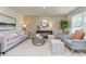 Cozy living room with comfy seating and a neutral color palette at 3865 Lady Bug Dr., Shallotte, NC 28470