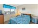 Bedroom with a double bed and window at 4719 S Ocean Blvd. # 209, North Myrtle Beach, SC 29582