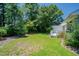 Landscaped backyard with lush green grass at 1492 Fox Hollow Way, North Myrtle Beach, SC 29582