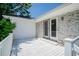 White deck with french doors leading to the inside at 1492 Fox Hollow Way, North Myrtle Beach, SC 29582