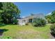 Exterior of a light brick house with a deck at 1492 Fox Hollow Way, North Myrtle Beach, SC 29582