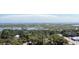 Scenic aerial view of the coastal community, showing water views and dense tree coverage at 590 Collins Ave., Murrells Inlet, SC 29576