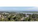 Wide aerial view showing neighborhood, marshland, and ocean in the distance at 590 Collins Ave., Murrells Inlet, SC 29576