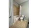 Cozy bathroom with tub and shower combination, toilet and tiled floors at 590 Collins Ave., Murrells Inlet, SC 29576