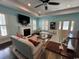 Spacious living room featuring a cozy fireplace, wood floors, and ample seating at 590 Collins Ave., Murrells Inlet, SC 29576
