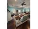 Open-concept living space featuring a cozy fireplace and comfortable seating at 590 Collins Ave., Murrells Inlet, SC 29576