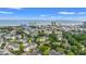 Expansive aerial view of a residential community near the ocean, showcasing apartment buildings and abundant greenery at 601 Hillside Dr. N # 2903, North Myrtle Beach, SC 29582