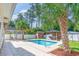 Spacious backyard with pool, hot tub, and patio area at 627 3Rd Ave. S, Surfside Beach, SC 29575