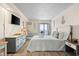 Bright bedroom featuring ocean view, coastal accents, and comfortable bedding at 1207 S Ocean Blvd. # 20808, Myrtle Beach, SC 29577