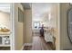 Hallway leading to a bedroom with a bar table, wooden floors, and beach view at 1207 S Ocean Blvd. # 20808, Myrtle Beach, SC 29577