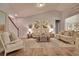 Bright and airy living room with hardwood floors and comfortable seating at 742 Isle Verde Dr, Myrtle Beach, SC 29579