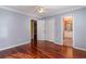 Hardwood floor bedroom with double doors and en-suite bathroom at 1335 Hidden Harbor Rd., Myrtle Beach, SC 29577