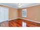 Hardwood floor bedroom with ceiling fan and plantation shutters at 1335 Hidden Harbor Rd., Myrtle Beach, SC 29577