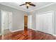 Hardwood floor bedroom with double doors leading to en-suite bathroom at 1335 Hidden Harbor Rd., Myrtle Beach, SC 29577