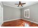 Bright bedroom featuring hardwood floors and plantation shutters at 1335 Hidden Harbor Rd., Myrtle Beach, SC 29577