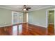 Serene bedroom with hardwood floors and private access to balcony at 1335 Hidden Harbor Rd., Myrtle Beach, SC 29577