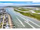 Breathtaking aerial shot of a coastal community with boats cruising through the waterways at 1907 S Waccamaw Dr., Garden City Beach, SC 29576