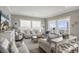Comfortable living room with large windows offering breathtaking ocean views at 1907 S Waccamaw Dr., Garden City Beach, SC 29576